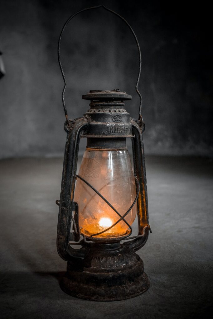 His light is like this: there is a niche, and in it a lamp; the lamp inside a glass, a glass like a glittering star